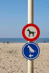 Dog signs on the beach