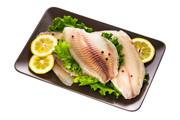 Whitefish Tilapia Fish Raw Fillet Isolated on White Background. Selective focus.