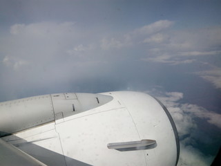 Naklejka na ściany i meble aerial view of wing of an airplane