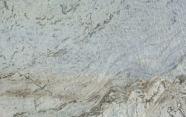 The texture of the stone. Untreated marble. Natural background