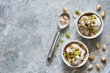 Chocolate, vanilla ice cream with pistachios. View from above.