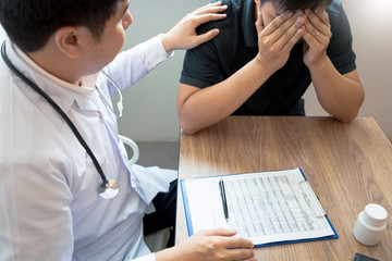Doctor explaining and giving a consultation to a patient medical informations and diagnosis about the treatment for condition in hospital, medical ethics concept.