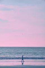 Girl on the beach during sunset