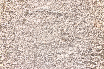 Beige painted grunge wall rough texture
