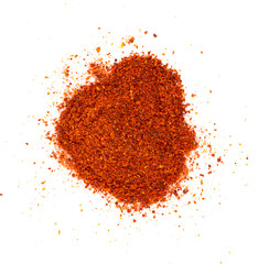 Pile of red paprika powder on white background