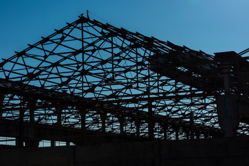 Silhouette of Roof Framework in abandoned factory