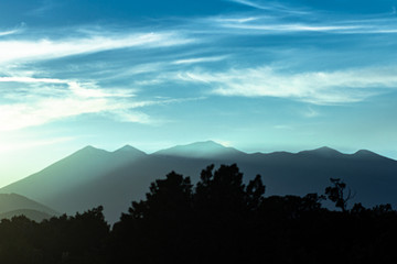 a blue sunset falls in the Arizona mountains 