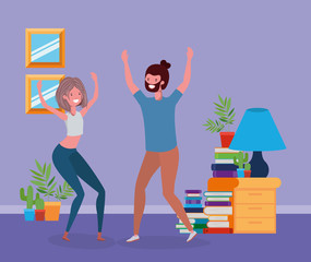 young couple dancing in the livingroom