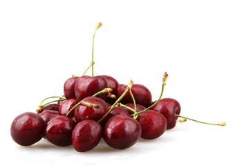 Closeup Of Ripe Cherry On White Background
