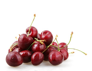 Closeup Of Ripe Cherry On White Background