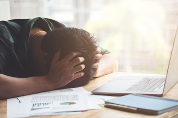 Burnout Syndrome, Man sleeping at his desk working over a laptop,Tried overworked, Freelance man...
