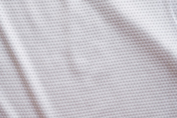 White fabric sport clothing football jersey with air mesh texture background