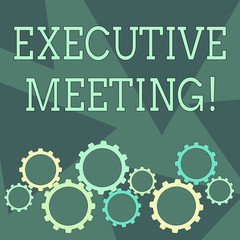 Conceptual hand writing showing Executive Meeting. Concept meaning discuss a specific topic with boards and general members Cog Wheel Gear Engaging, Interlocking and Tesselating