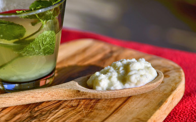 Water kefir drink with fresh mint leaves