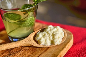 Water kefir drink with fresh mint leaves