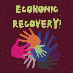 Fototapeta premium Handwriting text Economic Recovery. Conceptual photo rise of business activity signaling the end of a recession Color Hand Marks of Different Sizes Overlapping for Teamwork and Creativity