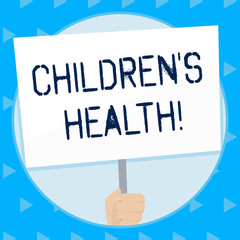 Word writing text Children S Is Health. Business photo showcasing kid condition of being free from illness or disease Hand Holding Blank White Placard Supported by Handle for Social Awareness