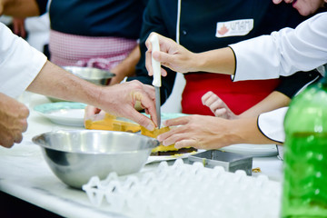 Obraz na płótnie Canvas chef preparing food in kitchen