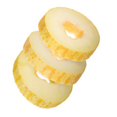 rings of yellow melon fall isolated on white background