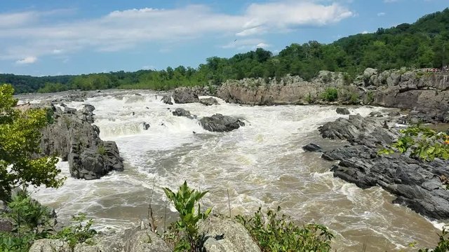 The Potomac river rapids swollen by heavy rains, at the Great Falls, in Maryland, USA