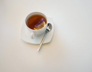 Cup of tea on white table