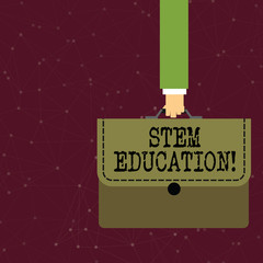 Handwriting text writing Stem Education. Conceptual photo develop to prepare primary and secondary students for college Businessman Hand Carrying Colorful Briefcase Portfolio with Stitch Applique