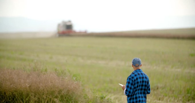 farmer using digital tablet agriculture