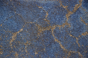 Obraz na płótnie Canvas Rough extreme worn ground blue painted grunge vintage texture background