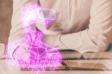 Abstract man wearing augmented reality headsets computer science work. AR concept. Double exposure.