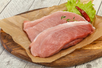 Juicy raw pork steak meat