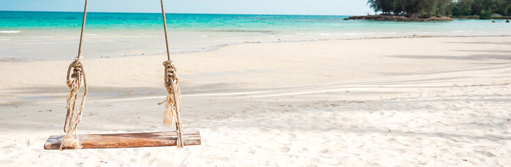 Banner size,Swings on the beach by the sea, the concept of summer relaxation