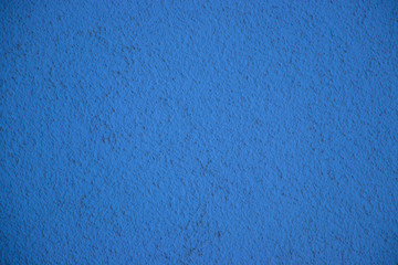Blue painted wall concrete stucco surface texture