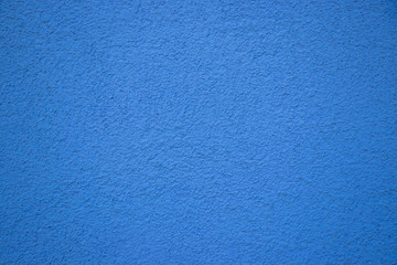 Fototapeta na wymiar Blue painted wall concrete stucco surface texture