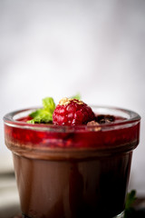 Dark Chocolate Mousse Pudding with Raspberries.