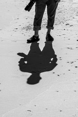shadow of person on beach