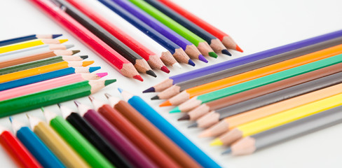 Fototapeta premium colored pencils lying in rows