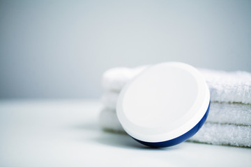 Spa concept. Moisturizing cream and aloe on table in bath room
