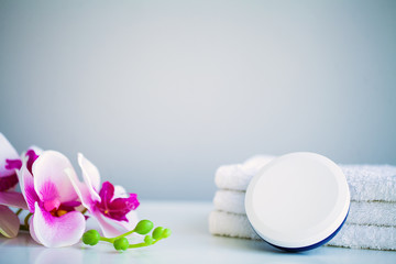 White towels on white table with copy space on bath room background