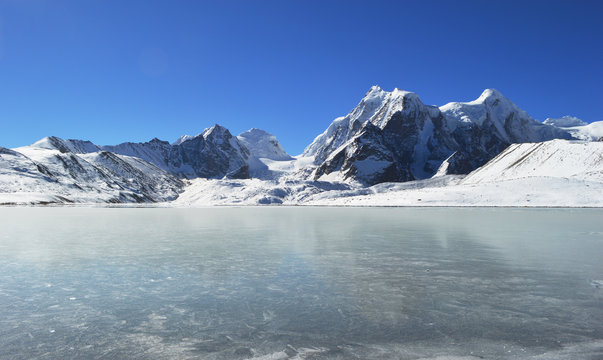 Beautiful frozen Gurudongmar Lake ,main tourist attraction of Gangtok,Sikkim,india  Stock Photo | Adobe Stock
