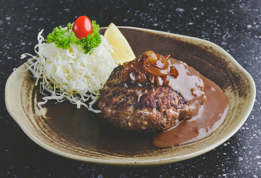 Japanese style hamburger grilled with gravy sauce.