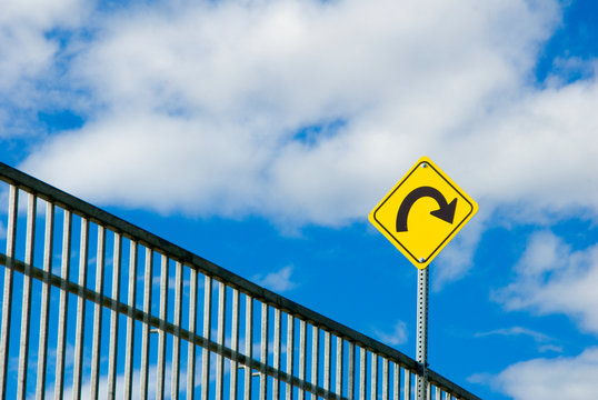 Road Sign Warning of a Turn