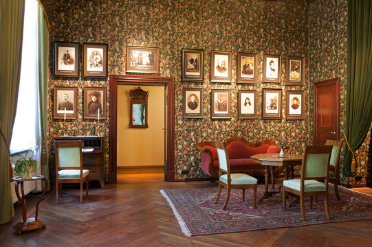 Room With Framed Portraits