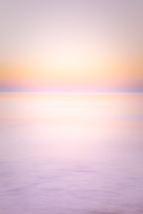 Ocean sunset sky - gorgeous panorama twilight sky and peaceful water background