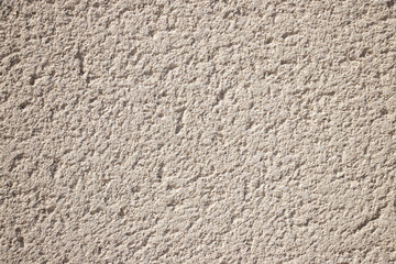 Beige painted grunge wall rough texture