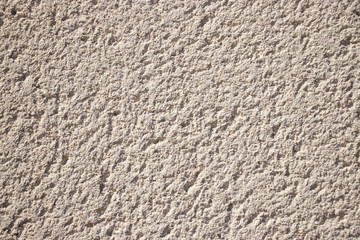 Beige painted grunge wall rough texture