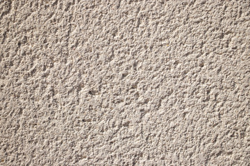 Beige painted grunge wall rough texture