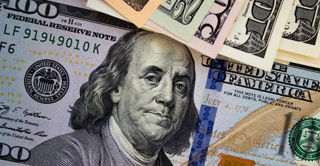 Obraz na płótnie Canvas American dollars close up. Background from dollars