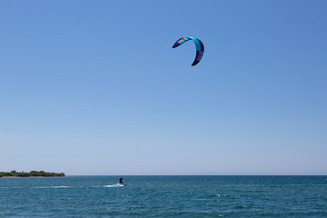 Man KiteBoarding, Fun in the ocean, Extreme Sport Kitesurfing
