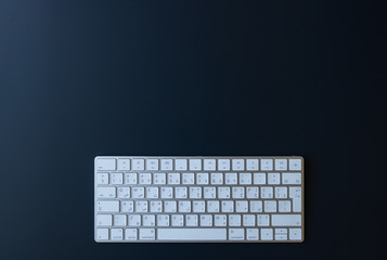 arabic keyboard on dark blue background with space for text or image