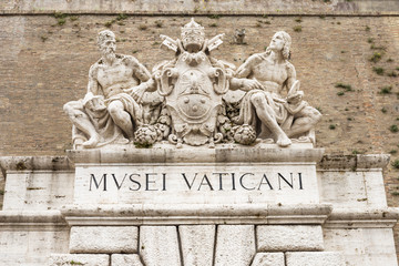 Sculptures above an entrance to the Vatican Museums in Rome, Italy.